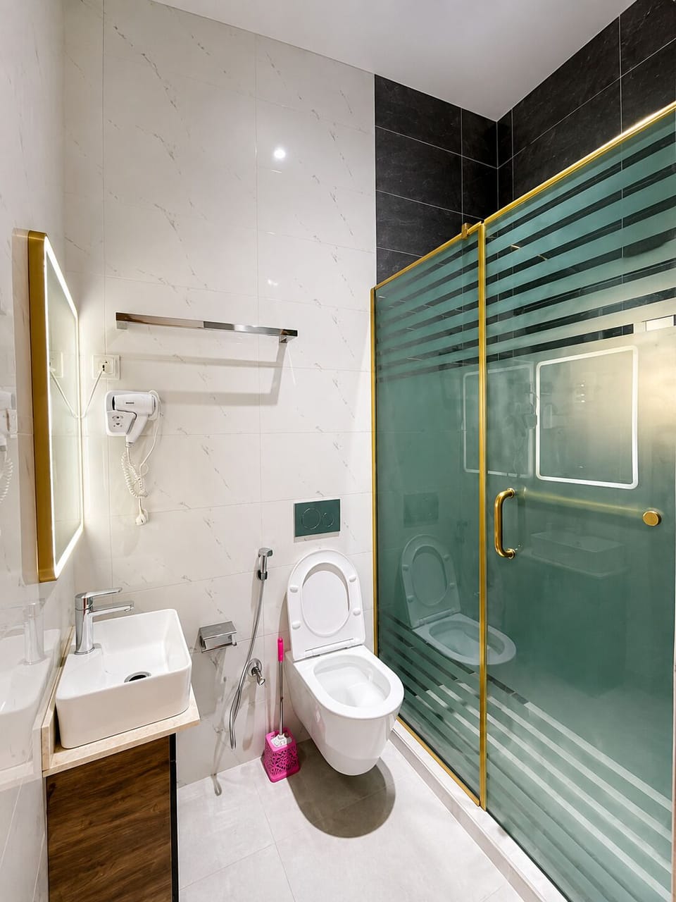 Shower, hair dryer, towels, soap