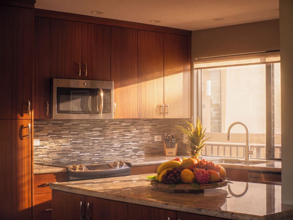 Full kitchen with mahogany cabinets.