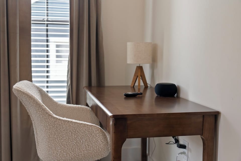 [Primary Bedroom - 2nd Floor | Desk & Chair workspace, Snooz Pro white noise machine for an uninterrupted sleep]