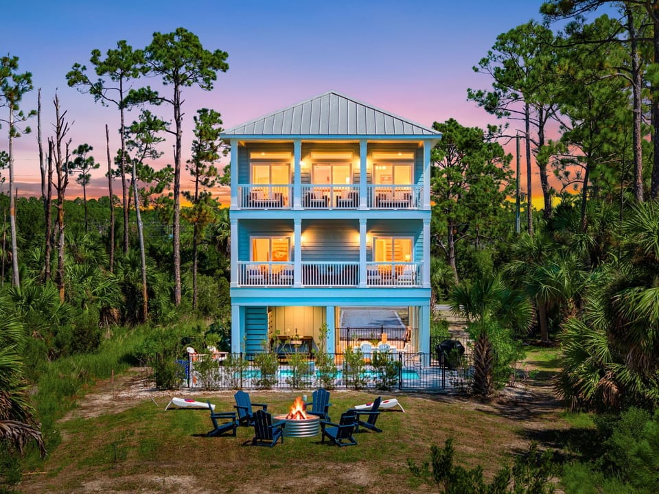 Gather around the fire pit after a day at the beach, surrounded by peaceful Old Florida scenery and unforgettable sunsets.