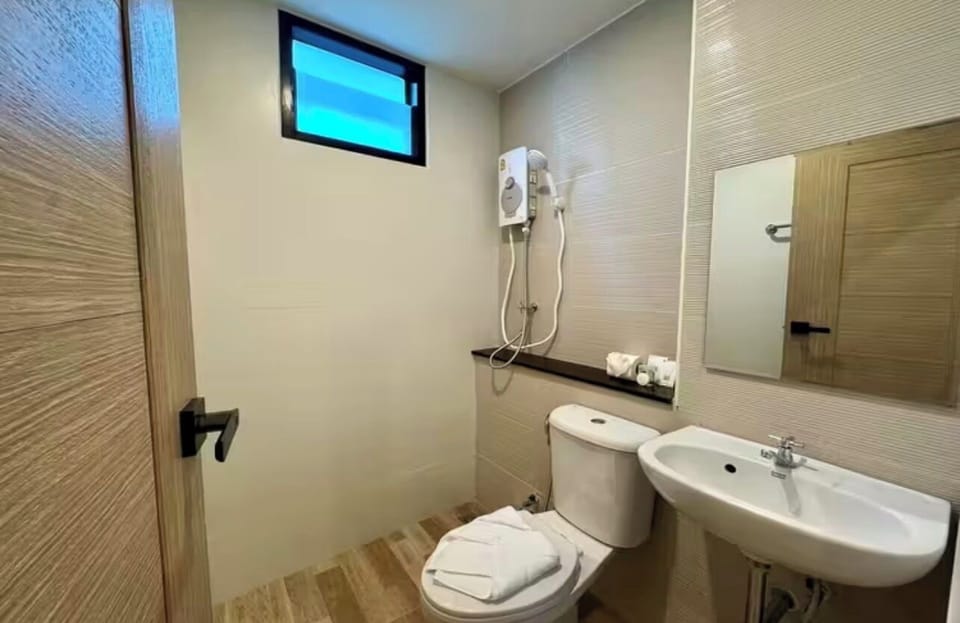 Hair dryer, towels, soap, shampoo