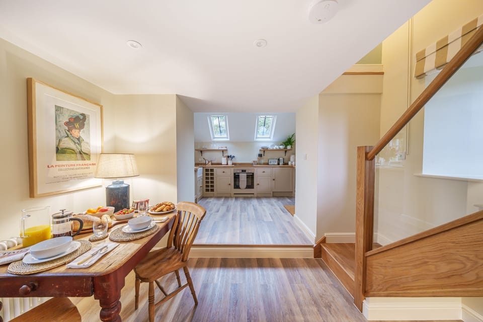 Puddle Cottage, Chebbard, Dorchester: The dining area and stairs to the first floor