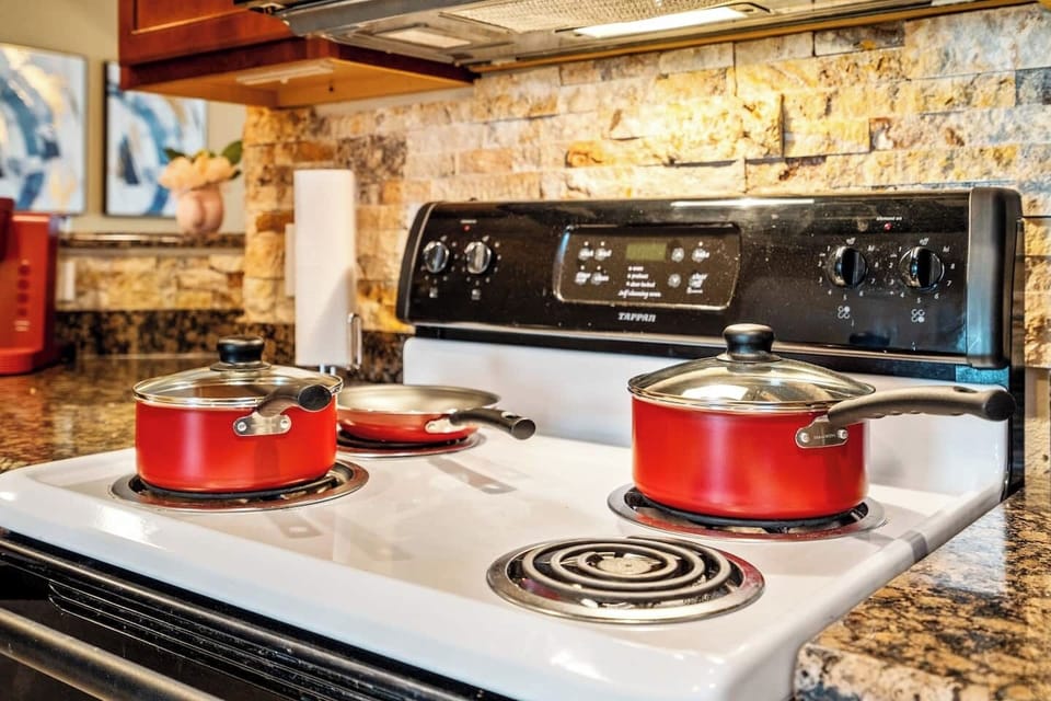 Cook like home in this fully equipped Crowley kitchen with stove, cookware and meal-prep essentials—ideal for construction crews, contractors, insurance housing and extended stays needing convenient home-cooked meals.