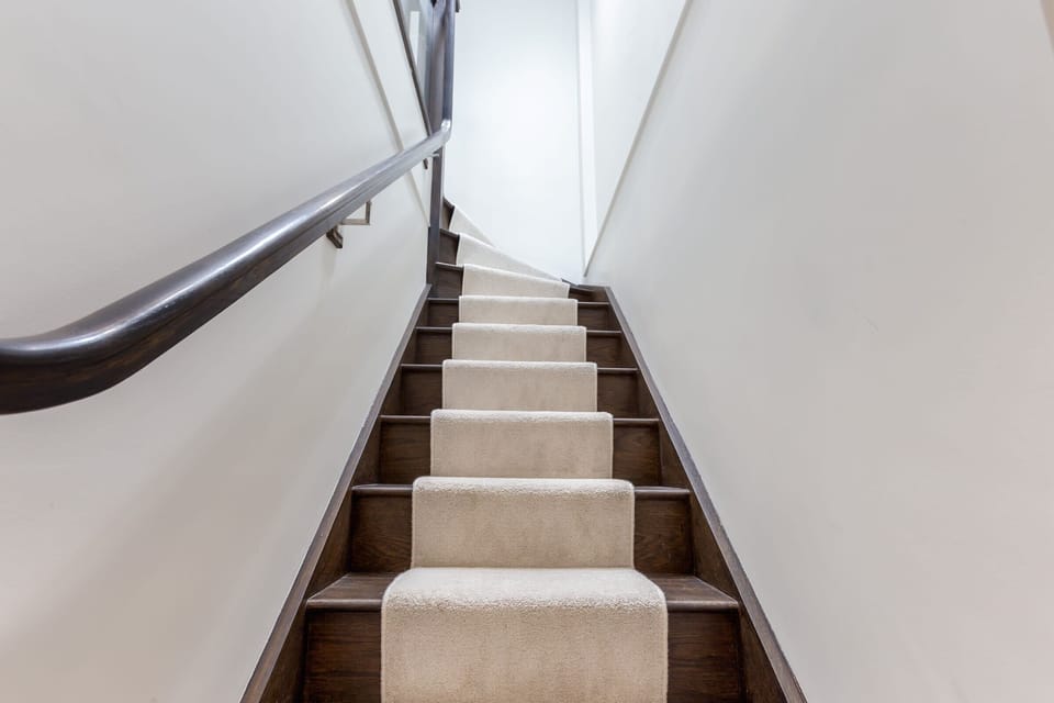 The staircase leading up to the flat