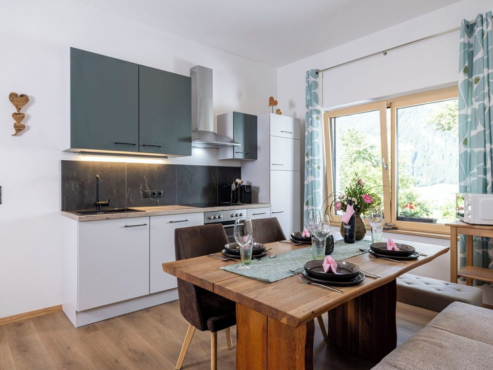 Furniture, Interior Design, Kitchen, Countertop, Flooring, Kitchen Appliance, Wood, Chair, Cabinetry, Ceiling