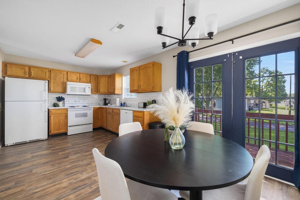 Bright eat-in kitchen with deck access and sunny dining space