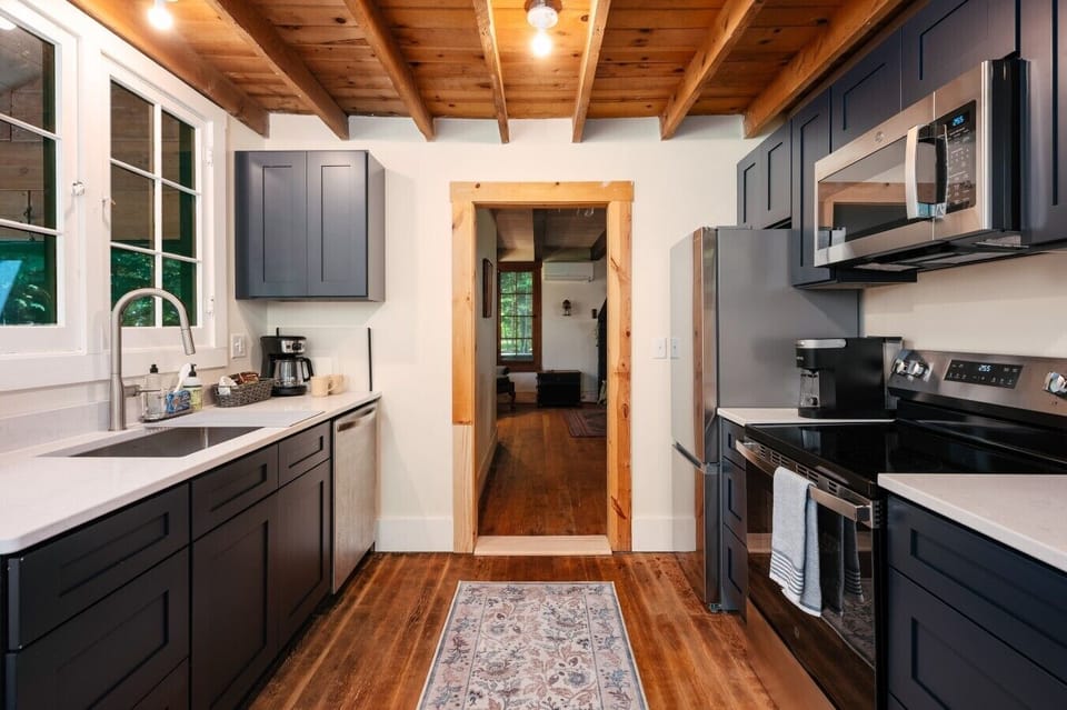 Clean kitchen sink and counter setup ready for your cooking needs! 🚰🍳✨