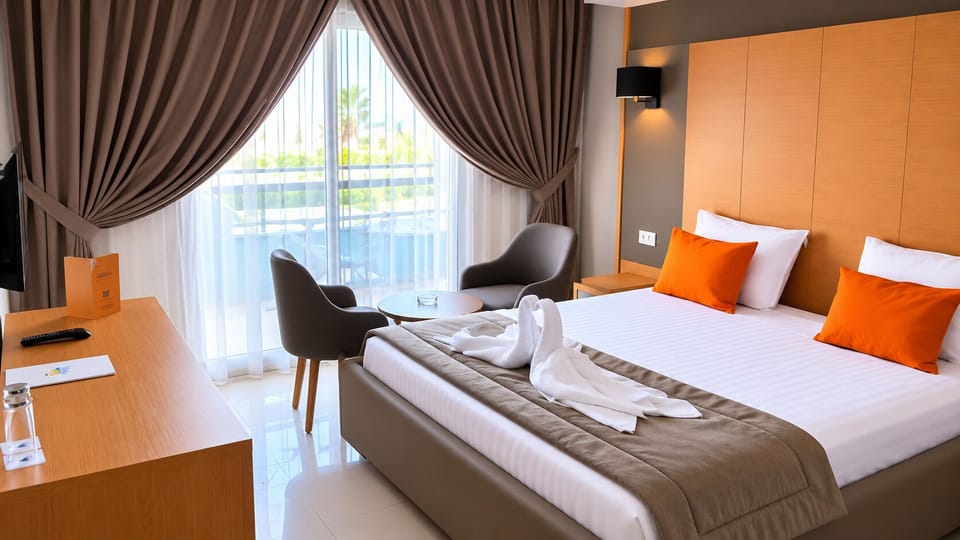 In-room safe, desk, laptop workspace, blackout drapes