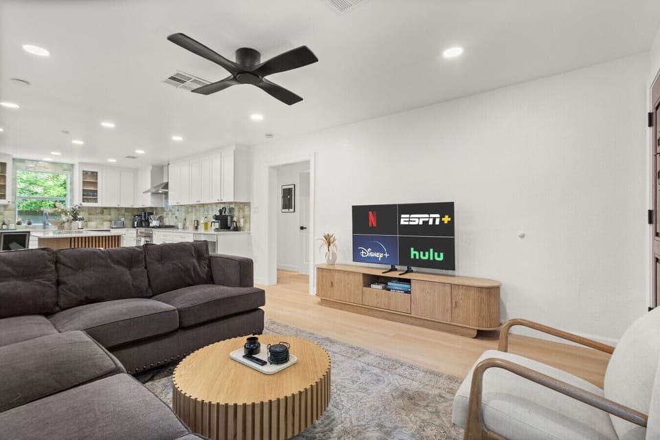 Stream your favorite shows on the large Smart TV with Netflix, Hulu, Disney+ and more, all from the comfortable sectional.