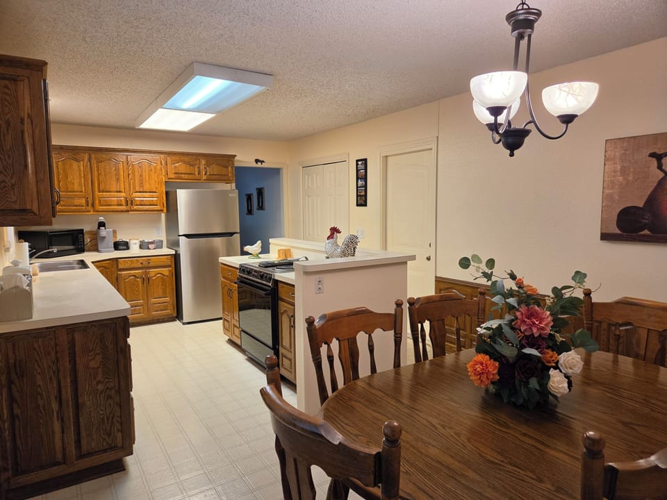 This kitchen is ready for you to prepare a meal or enjoy some coffee. 