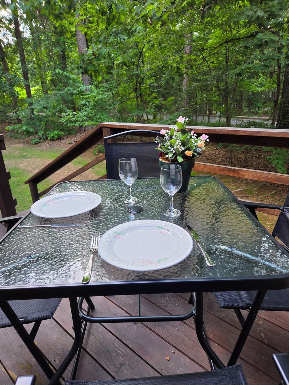 a Table for 4 on this deck awaits you for a drink or meal.
