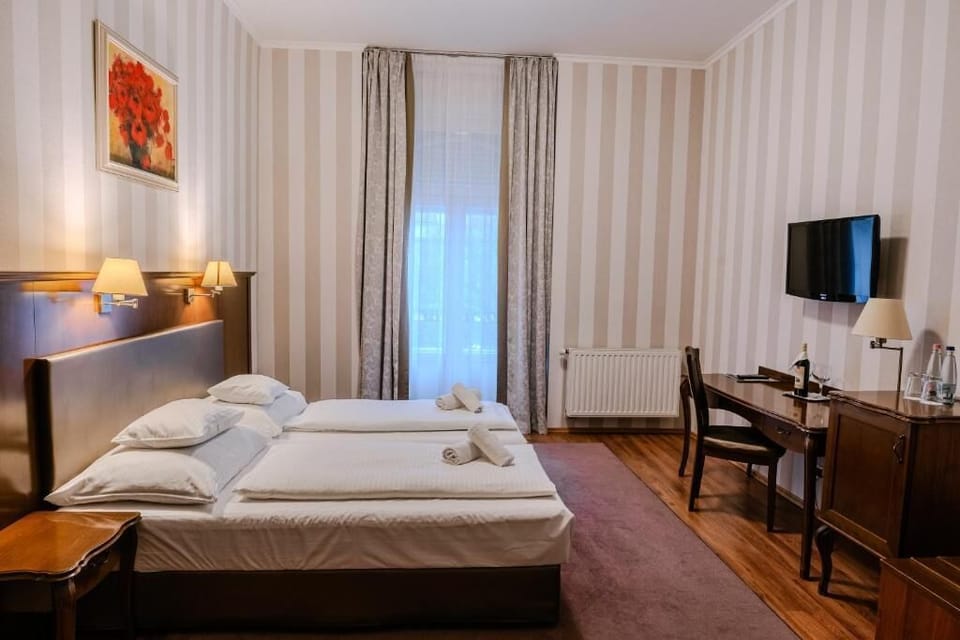 Deluxe Double or Twin Room, Balcony, City View | Hypo-allergenic bedding available, desk, laptop workspace, WiFi (free)