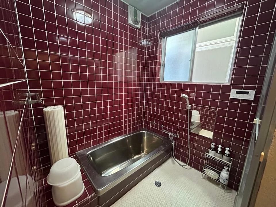 Twin Room, Non Smoking, City View | Bathroom | Combined shower/tub, free toiletries, hair dryer, slippers