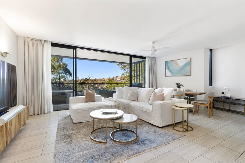 Open Plan Living Area with kitchen, living area, dining area and balcony