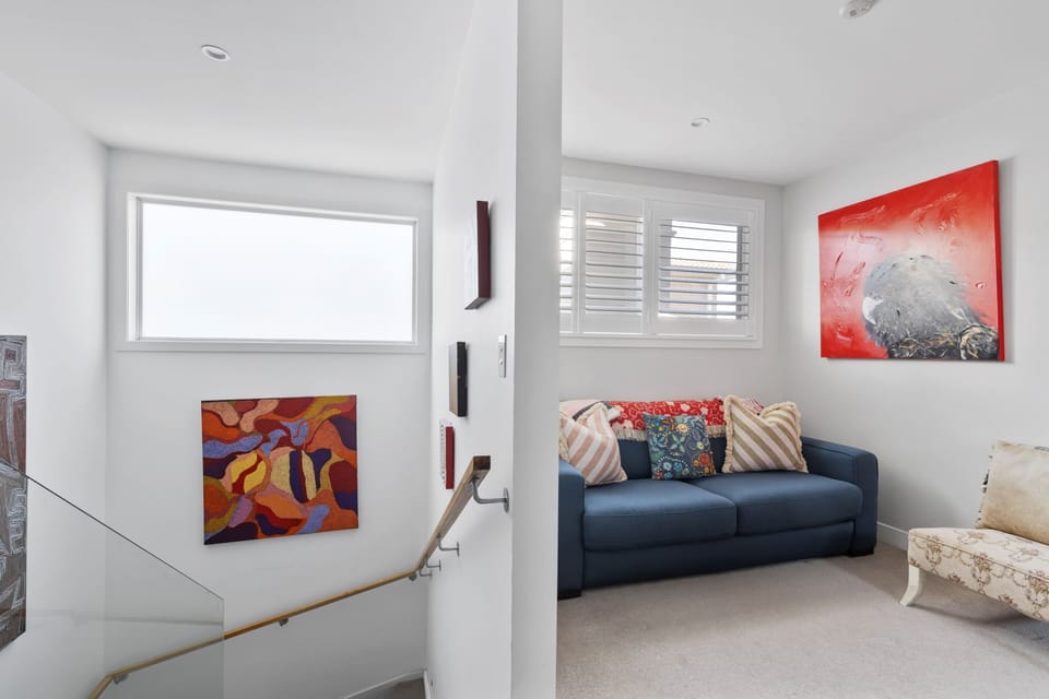 Artwork, Stairs and Sofa Bed Shot