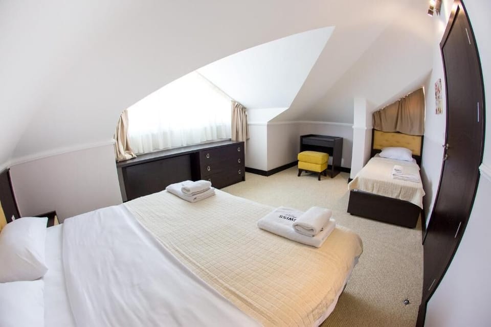 Apartment, Balcony, Garden View | Iron/ironing board, WiFi (free)
