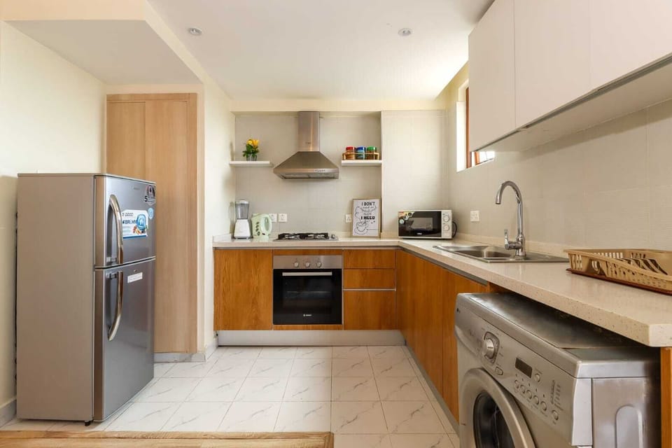 Classic Apartment, Balcony, City View | Private kitchen | Coffee/tea maker, full-size fridge, microwave, oven