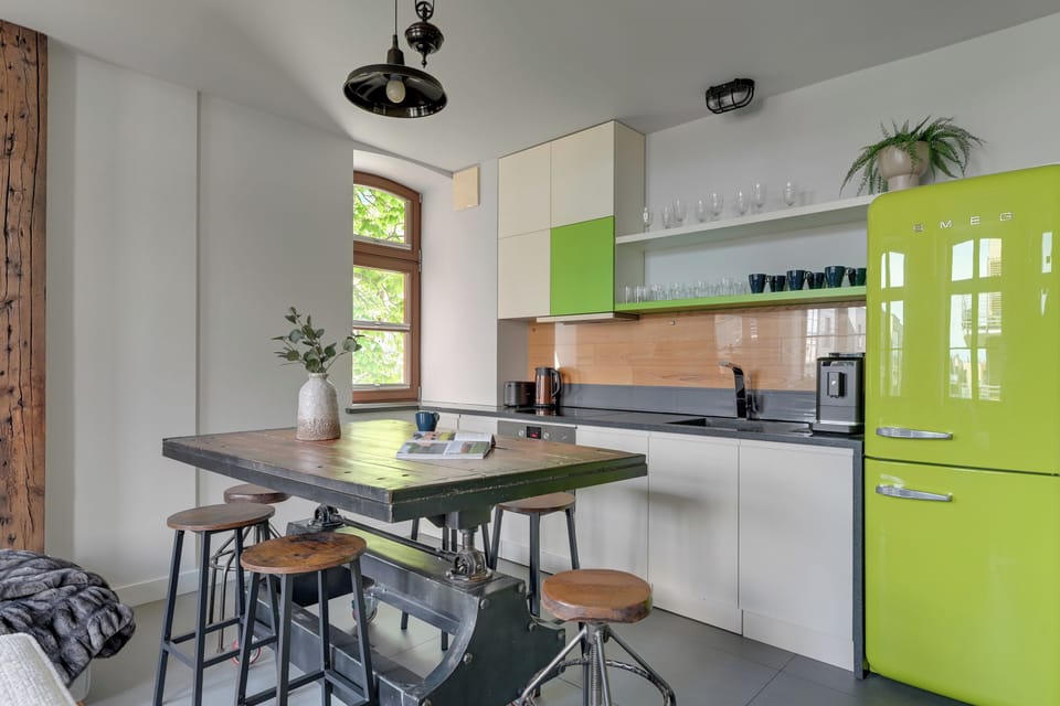 Deluxe Apartment | Private kitchenette | Coffee/tea maker, electric kettle, highchair, freezer