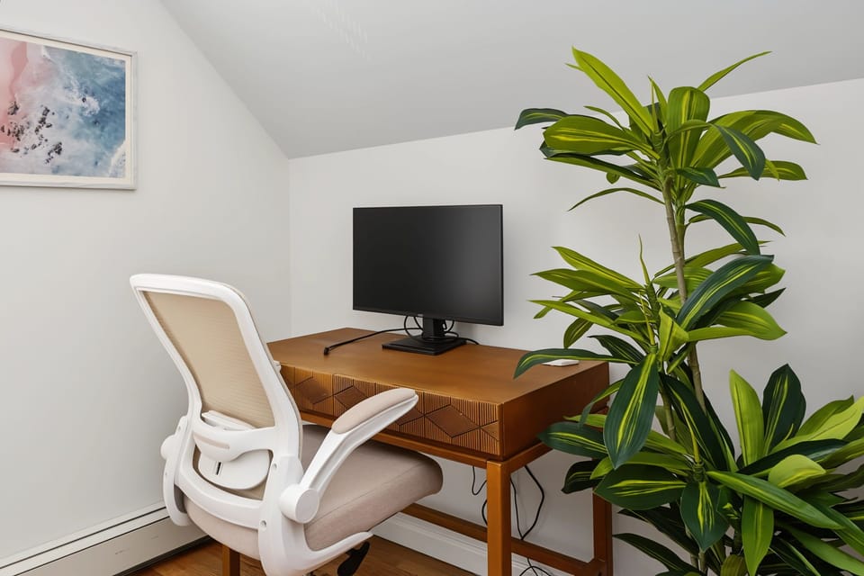 Equipped with a work area, perfect for guests working at home.