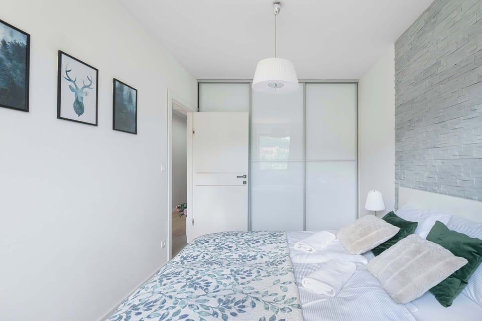 The bedroom features a luxurious double bed for a restful night's sleep.