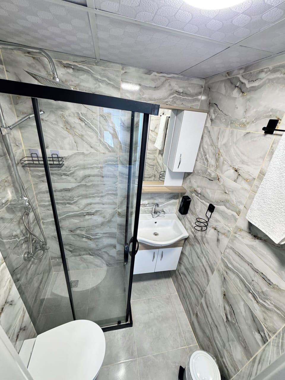Family Studio Suite, Balcony, Sea View | Bathroom | Shower, hair dryer, soap, shampoo