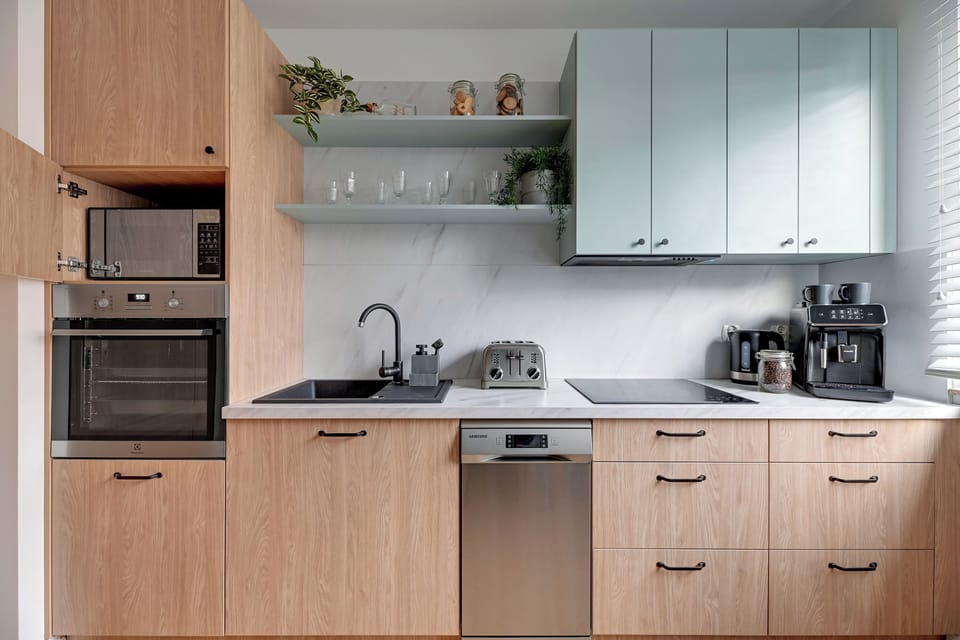 Family Apartment, Balcony | Private kitchen | Coffee/tea maker, microwave, electric kettle, toaster