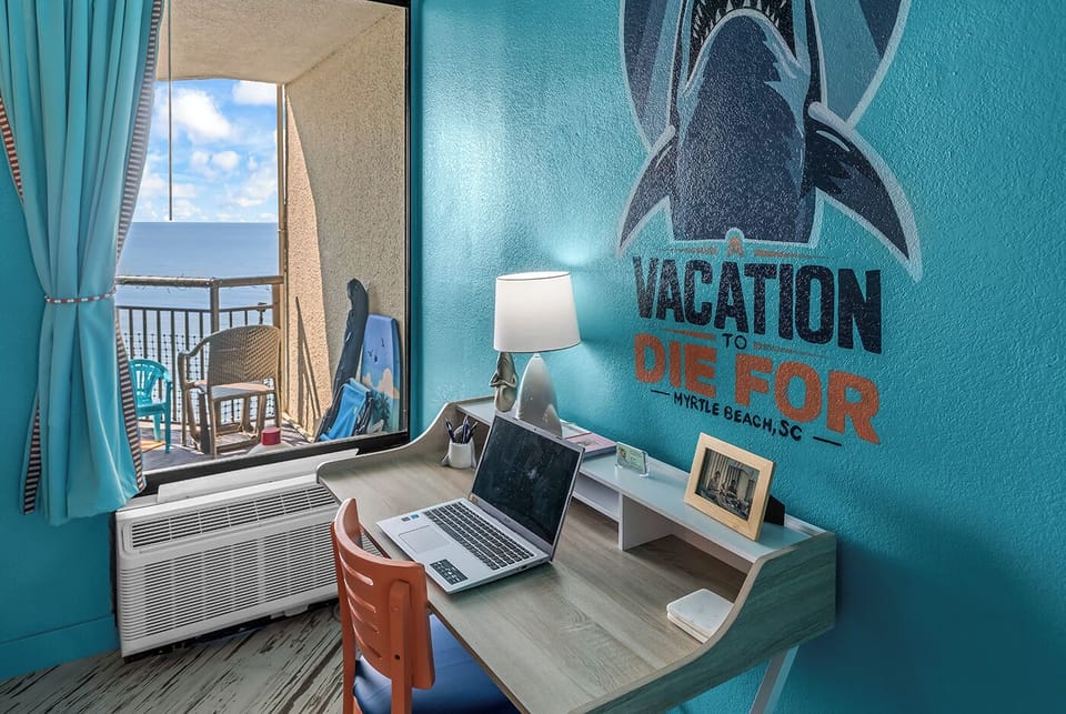 Even work feels better with an Atlantic view, a dedicated desk, and a little Salty Bite personality in the background.
