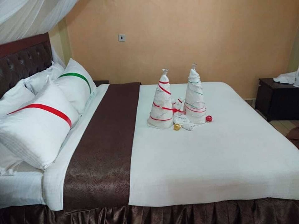 Luxury Double Room, City View | In-room safe, desk, laptop workspace, blackout drapes