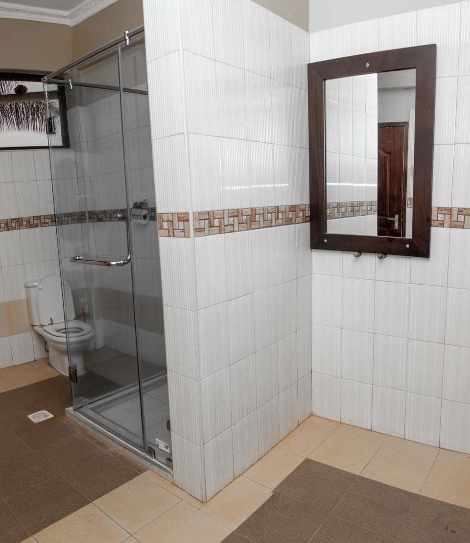 Shower, slippers, towels, soap