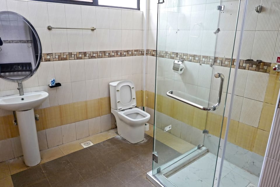 Deluxe Double Room, Pool View | Bathroom | Shower, slippers, towels, soap