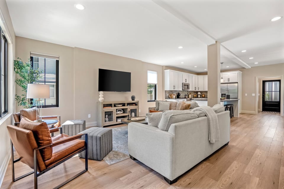 The Graduate - Comfortable living room area with a cozy couch and chairs—perfect for relaxing.