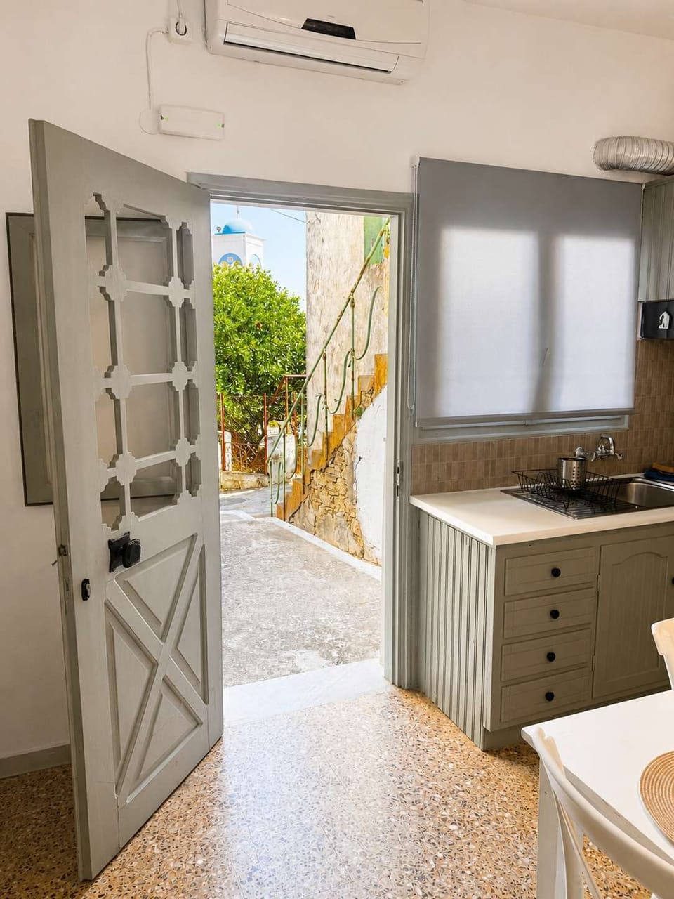 Functional Kitchen Area with Modern Appliances, Storage Space and Natural Light
