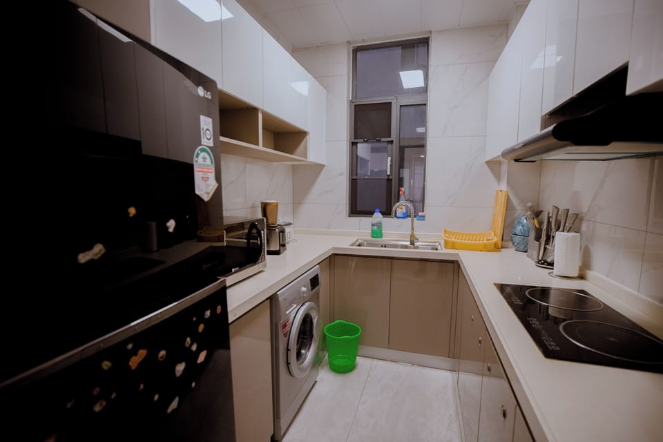 Executive Apartment, Balcony, Pool View | Private kitchen | Espresso maker, coffee/tea maker, full-size fridge, oven