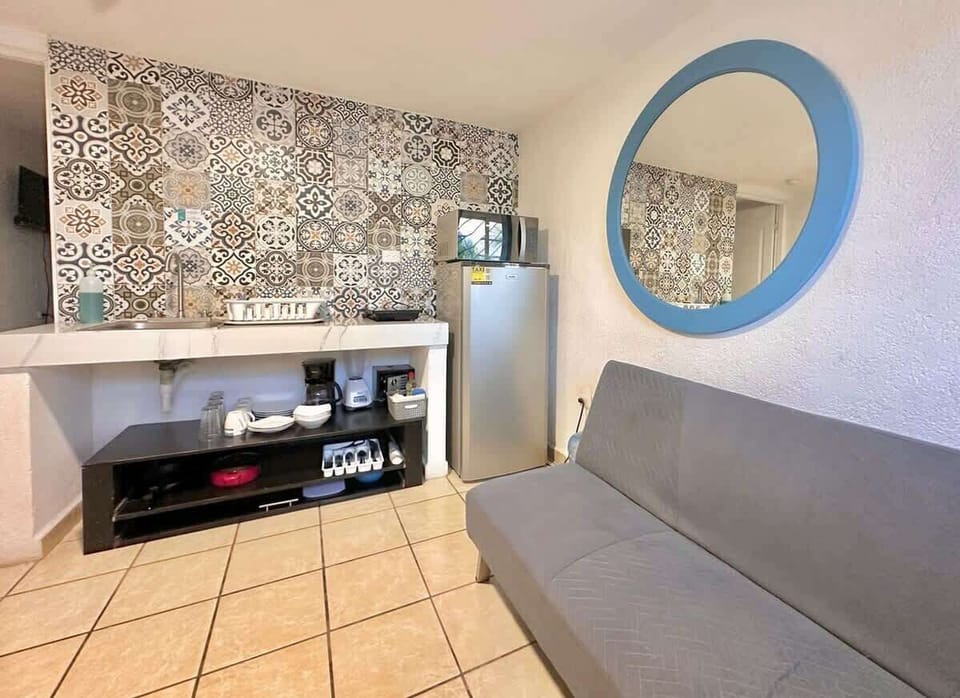 Open kitchen and dining space in the studio