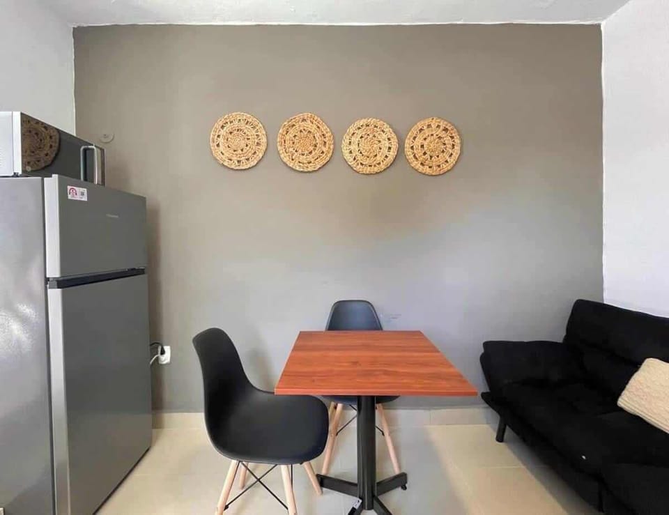 Equipped kitchenette - refrigerator, stove and dining table