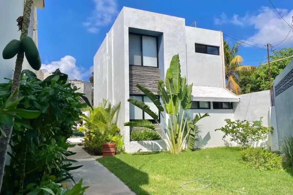 Building exterior - modern white facade (shared complex)