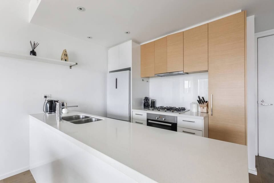 Whip up anything from a simple breakfast to a hearty dinner in the well-equipped kitchen, featuring an oven, cooktop, microwave, dishwasher and full-sized fridge.
