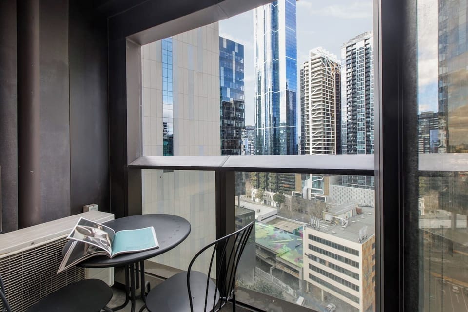 Step outside onto your private balcony, ideal for a morning coffee or unwinding with views above the bustling Southbank precinct.