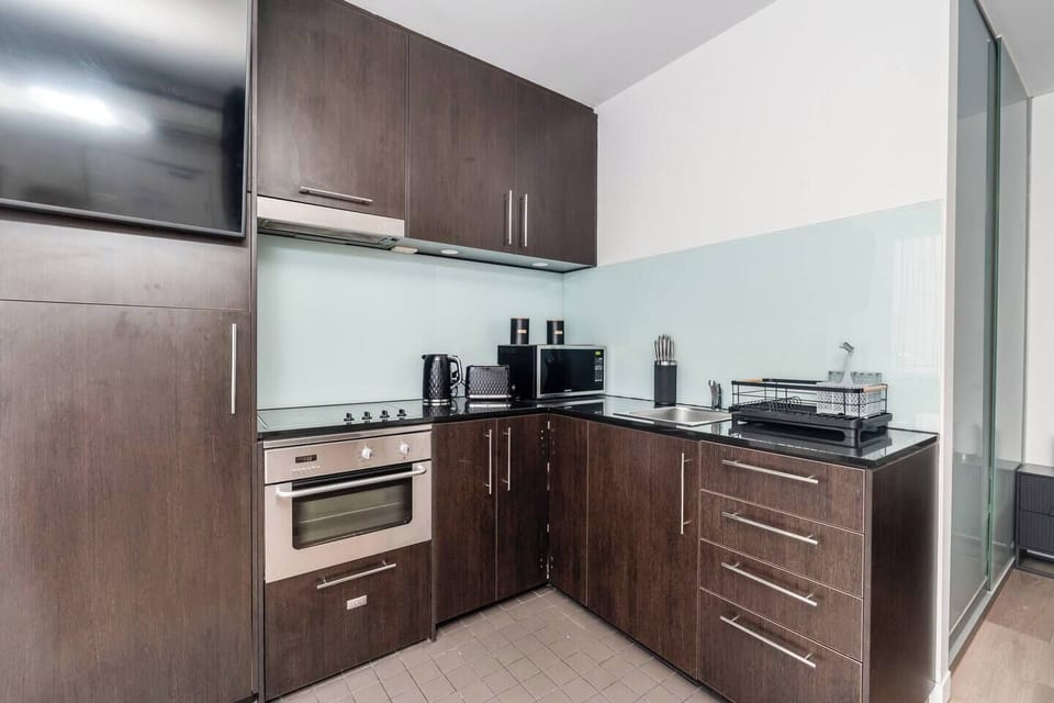 Prepare quick breakfasts or light bites in the well-equipped kitchen with a stovetop, oven, microwave, refrigerator, dishwasher, kettle, toaster and cooking essentials.