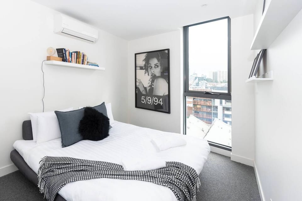 The second bedroom is also fitted with a queen-sized bed and air-conditioning for a good night's sleep.