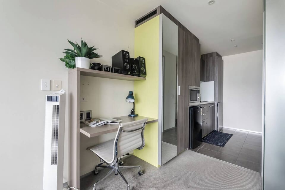 A thoughtfully positioned desk area offers a quiet and functional spot for work, reading, or planning your day.