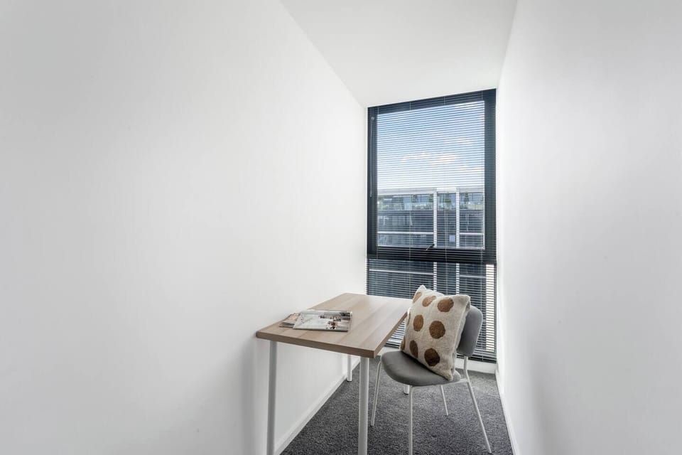A dedicated workspace, ideal for uninterrupted study or Zoom calls, has been set up within the primary bedroom.