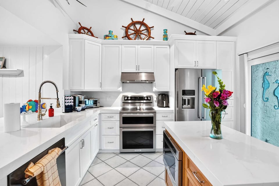 Fully provisioned for a 30-day stay. Every pot, pan, utensil, and appliance you need — just bring the groceries.