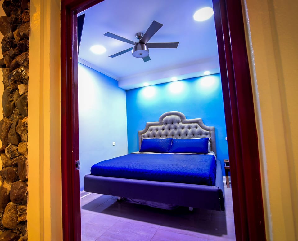Basic Single Room | Pillowtop beds, blackout drapes, iron/ironing board, WiFi (free)
