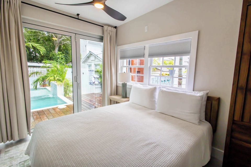 Luxury Queen Second Bedroom with Pool and Amenities Views and Close Second Bathroom
