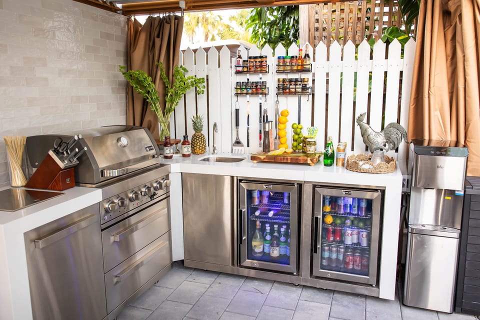 Outside Fully Equipped Kitchen with Grill, Two Refrigerators, and a Brio Water and Ice Maker