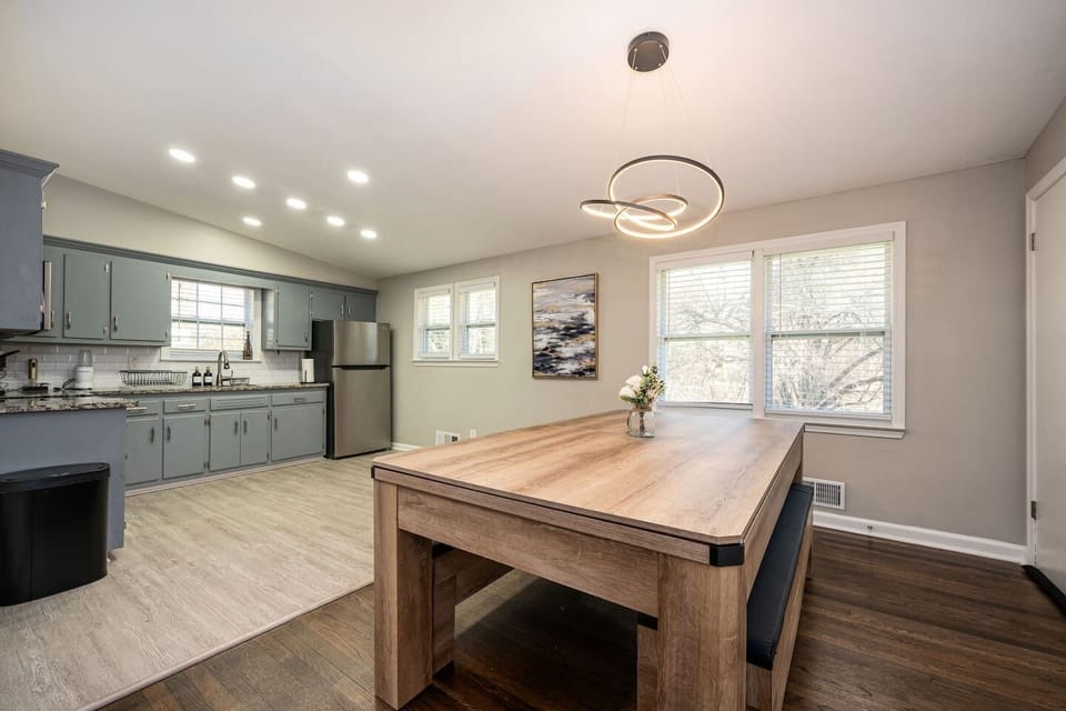 Open layout connecting the kitchen and dining area for easy gathering.