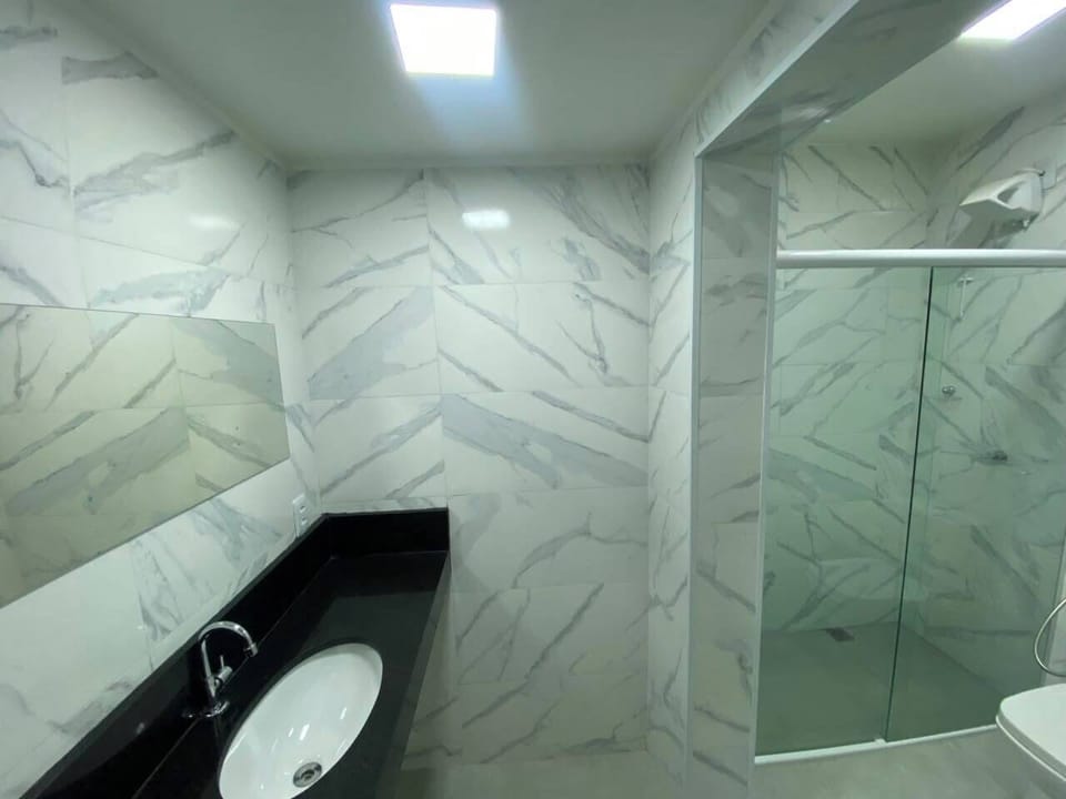 Comfort Triple Room | Bathroom | Shower, towels, soap, shampoo