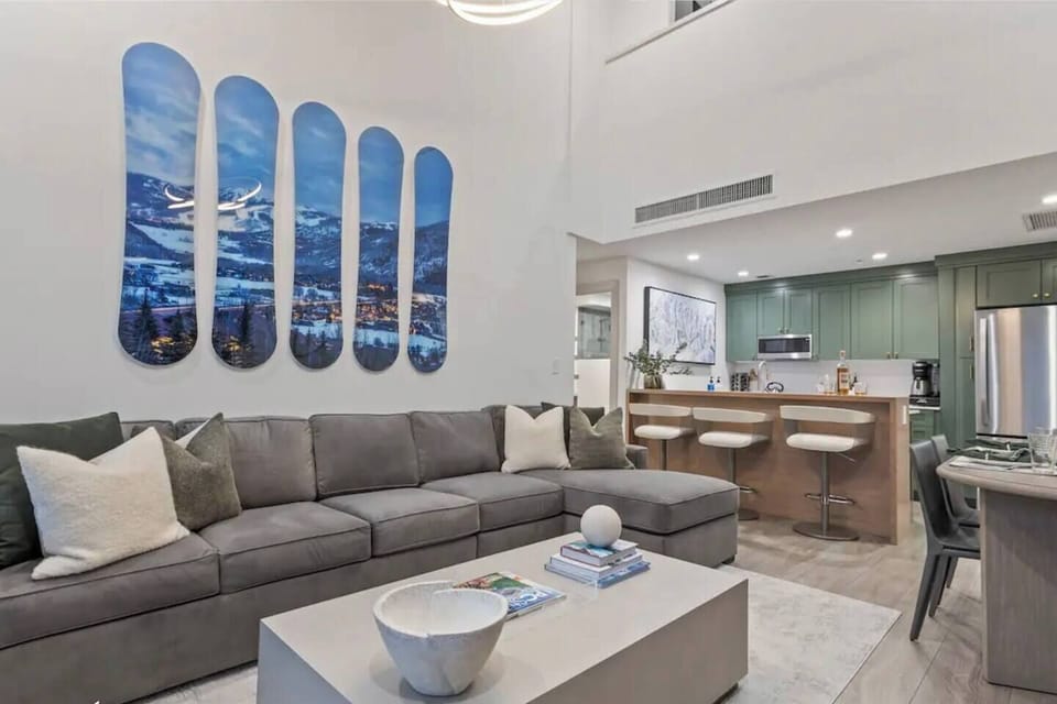 Living room with snowboard art of Park City