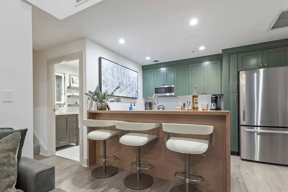 Kitchen bar and full bathroom. 